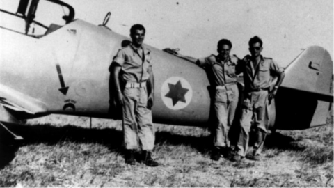 Lou Lenart, left, and other fighter pilots in front of the Avia S-199 plane. (Courtesy of Boaz Dvir via JTA)